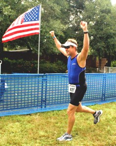 Me completing an Olympic Triathlon