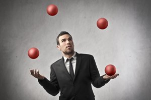 121002-businessman-juggling-lg
